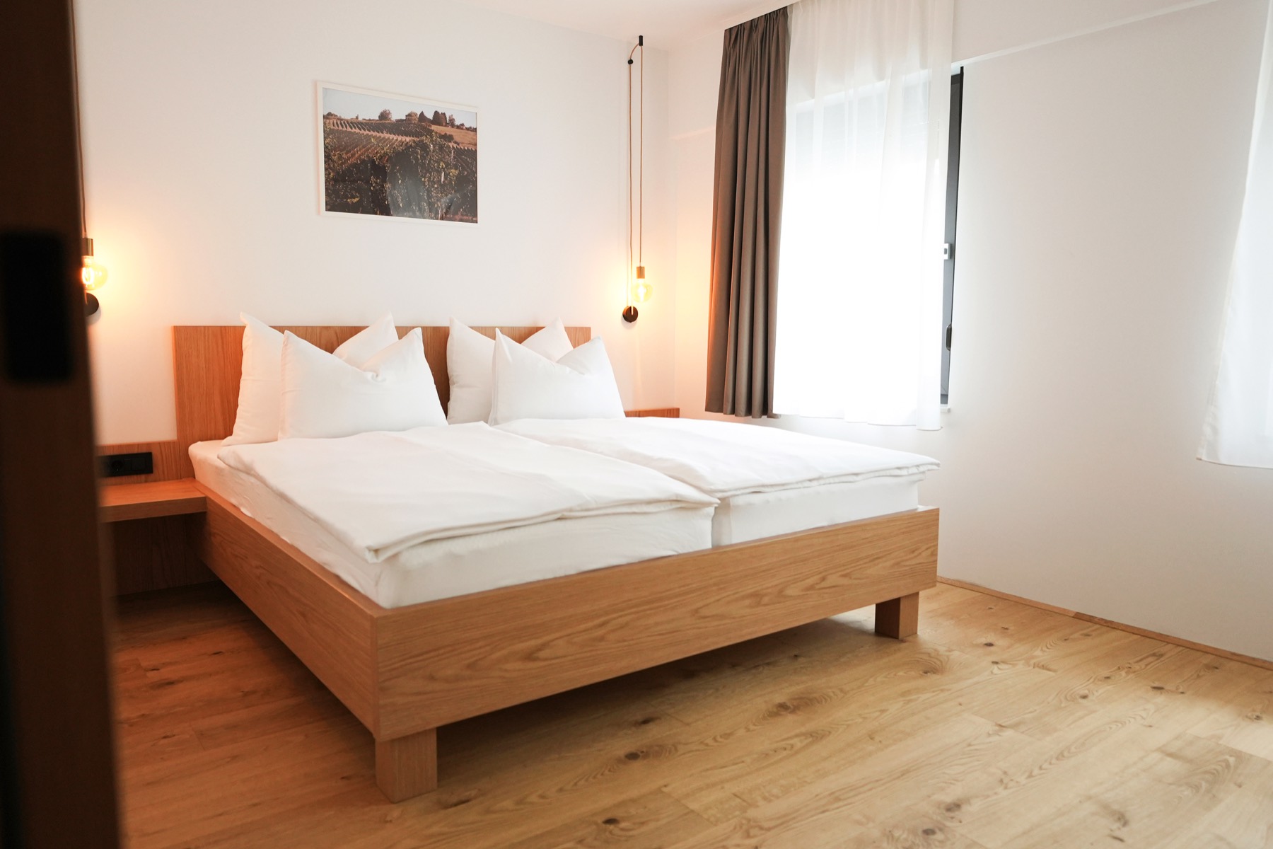 Bright bedroom in Apartment 1 at Gostilna Hrast